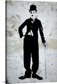  This is a captivating print of “Portrait Of Charlie Chaplin” that captures the essence of the iconic actor, comedian, and filmmaker. The monochromatic palette is accentuated by a textured backdrop, giving it a vintage allure while highlighting Chaplin’s unmistakable silhouette adorned in his classic attire - bowler hat, tailored suit, and cane. 