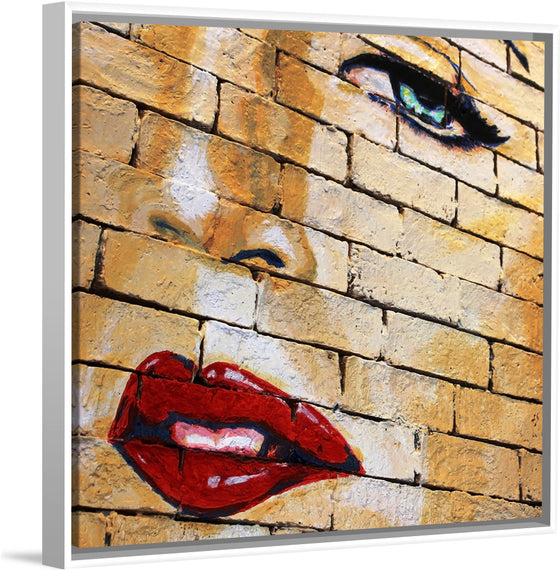 "Woman's Face Painted On Brick Wall"