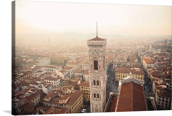 This exquisite print captures the breathtaking view of an iconic tower standing majestically amidst a sprawling cityscape. The tower, adorned with intricate designs, pierces through the serene skies as the city unfolds in harmonious sprawl beneath it. Every detail, from the misty horizon to the architectural elegance, is captured with impeccable precision. 