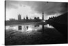 Immerse yourself in the enigmatic allure of London with this exquisite print of “The Palace of Westminster by the River Bank.” Every detail, from the iconic Big Ben to the majestic spires of Westminster, is captured with impeccable clarity. The monochromatic tones imbue a timeless elegance, while the reflection in the tranquil waters of the River Thames adds a touch of mystique. 