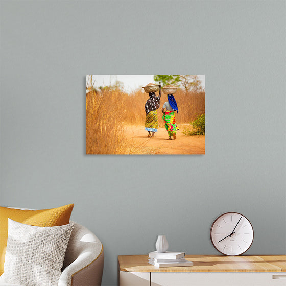 "Women in West Africa Village Carrying Baskets Filled With Shea Butter Fruits"