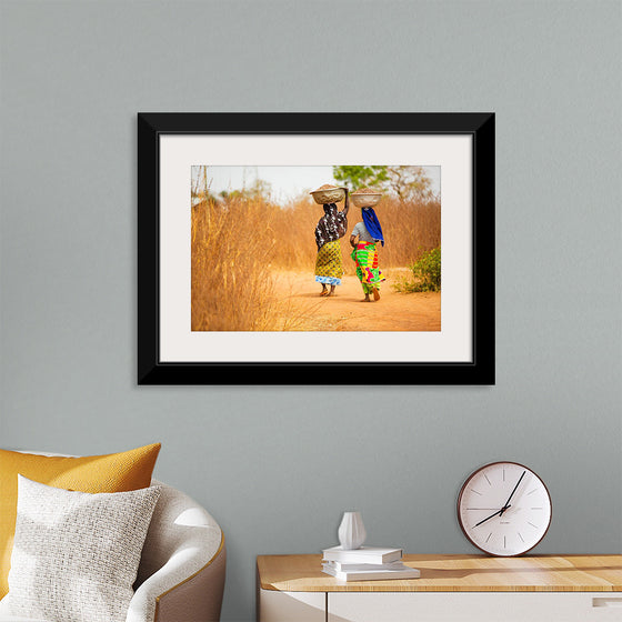 "Women in West Africa Village Carrying Baskets Filled With Shea Butter Fruits"