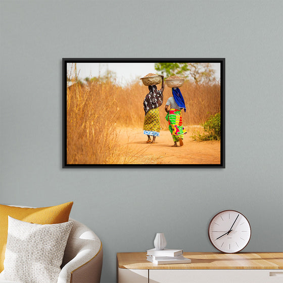 "Women in West Africa Village Carrying Baskets Filled With Shea Butter Fruits"