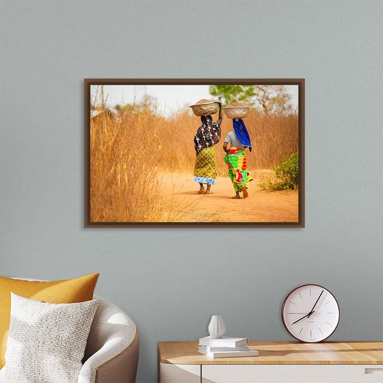 "Women in West Africa Village Carrying Baskets Filled With Shea Butter Fruits"