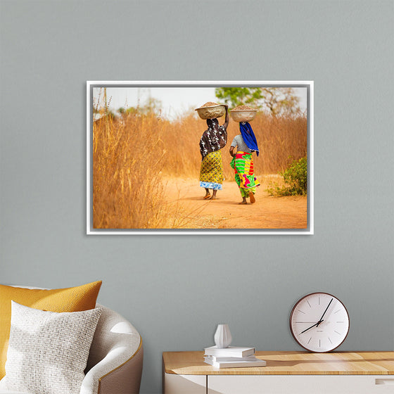 "Women in West Africa Village Carrying Baskets Filled With Shea Butter Fruits"