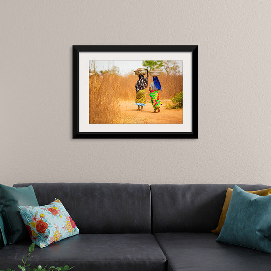 "Women in West Africa Village Carrying Baskets Filled With Shea Butter Fruits"