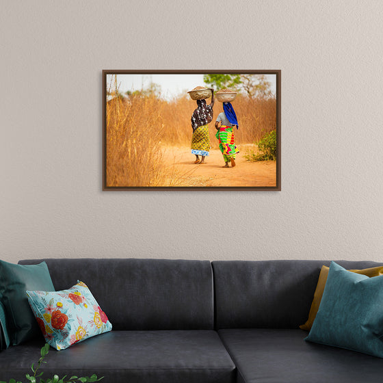 "Women in West Africa Village Carrying Baskets Filled With Shea Butter Fruits"