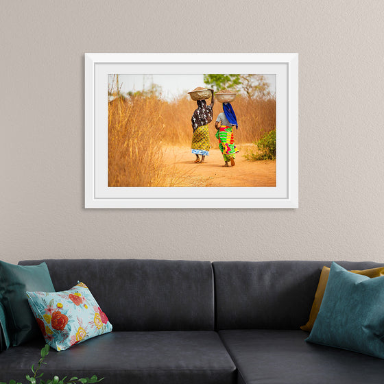 "Women in West Africa Village Carrying Baskets Filled With Shea Butter Fruits"