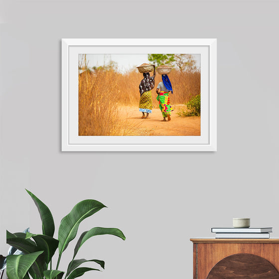 "Women in West Africa Village Carrying Baskets Filled With Shea Butter Fruits"