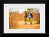 "Women in West Africa Village Carrying Baskets Filled With Shea Butter Fruits"