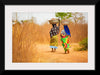 "Women in West Africa Village Carrying Baskets Filled With Shea Butter Fruits"