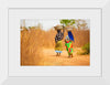 "Women in West Africa Village Carrying Baskets Filled With Shea Butter Fruits"