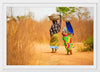 "Women in West Africa Village Carrying Baskets Filled With Shea Butter Fruits"