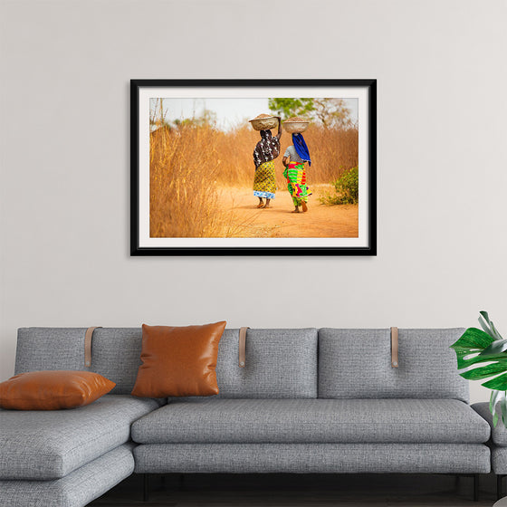 "Women in West Africa Village Carrying Baskets Filled With Shea Butter Fruits"