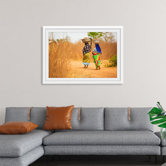 "Women in West Africa Village Carrying Baskets Filled With Shea Butter Fruits"