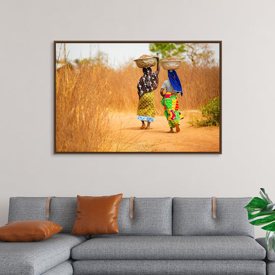 "Women in West Africa Village Carrying Baskets Filled With Shea Butter Fruits"