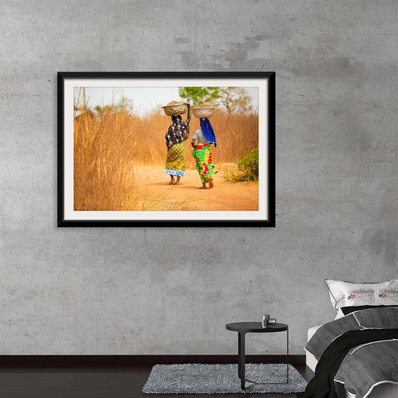 "Women in West Africa Village Carrying Baskets Filled With Shea Butter Fruits"