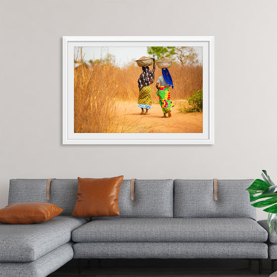 "Women in West Africa Village Carrying Baskets Filled With Shea Butter Fruits"