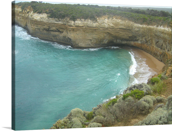 “Secluded Bay on the Great Ocean Road” by Smegs07 invites you to a hidden gem along Australia’s iconic coastal route. Here, azure waters gently kiss the golden sands of a secluded beach, nestled against majestic cliffs. The lush greenery crowning the cliffs adds vibrancy to their rugged beauty. 