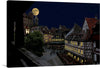 Immerse yourself in the enchanting atmosphere of this exquisite artwork, capturing a serene night in a charming old town. The full moon illuminates the sky, casting a gentle glow on the cobblestone streets and historic architecture. Every detail, from the warm light emanating from the windows to the tranquil ambiance of the town square, invites you into a world where time stands still.