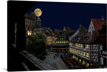  Immerse yourself in the enchanting atmosphere of this exquisite artwork, capturing a serene night in a charming old town. The full moon illuminates the sky, casting a gentle glow on the cobblestone streets and historic architecture. Every detail, from the warm light emanating from the windows to the tranquil ambiance of the town square, invites you into a world where time stands still.