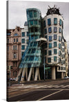 “The Dancing House” in Prague, Czech Republic, affectionately known as Ginger and Fred, is a captivating architectural marvel that defies convention. Designed by the Croatian-Czech architect Vlado Milunić in collaboration with Canadian-American architect Frank Gehry, this iconic building graces the Rašín Embankment along the Vltava River. Its swirling, dynamic form evokes a dance—a waltz between tradition and modernity. 