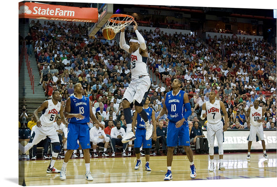 “Carmelo Anthony dunk USA vs Dominican Republic” by Daniel Hughes is a stunning print that captures the energy and excitement of a basketball game. The print features Carmelo Anthony, a professional basketball player, mid-dunk with the crowd in the background. 