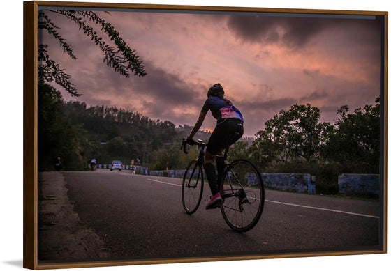 "Male bicycling along a treed road in Ooty"