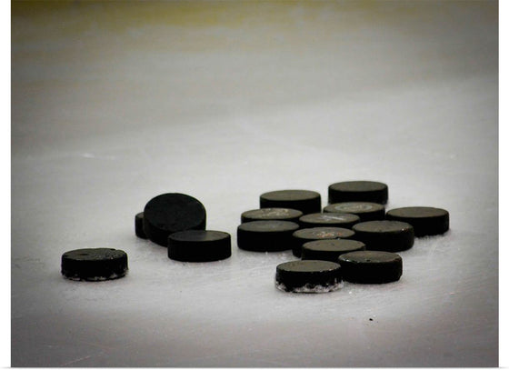 "Pile of Hockey Pucks"