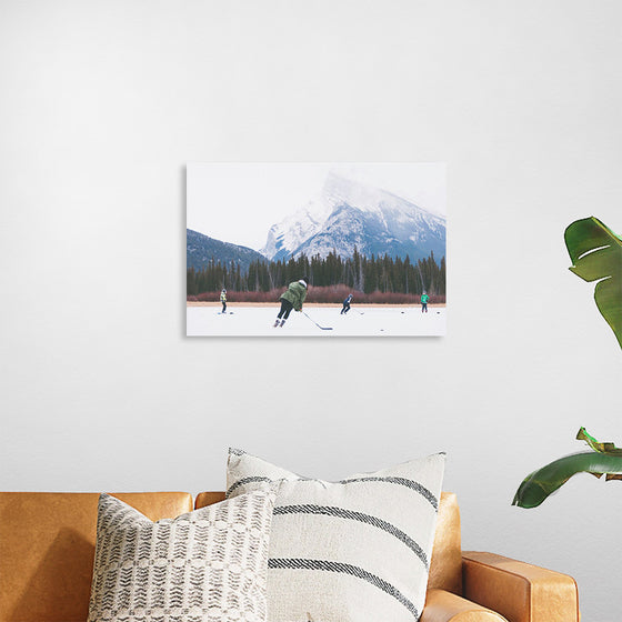 "Children Playing Ice Hockey in Banff National Park"