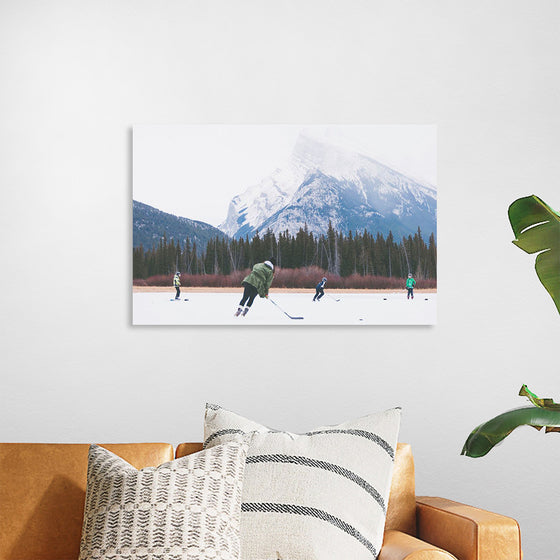 "Children Playing Ice Hockey in Banff National Park"