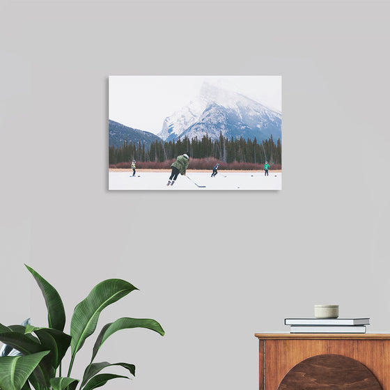 "Children Playing Ice Hockey in Banff National Park"