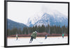 "Children Playing Ice Hockey in Banff National Park"