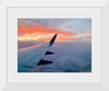 "Beautiful sunset sky view from airplane window"