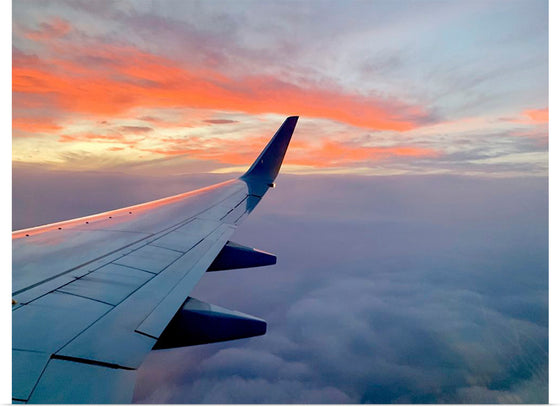 "Beautiful sunset sky view from airplane window"