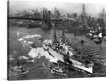  Immerse yourself in a moment of history with the “View of USS ARIZONA taken from Manhattan Bridge” artwork. This captivating black and white print transports you back in time, offering a glimpse of the majestic USS ARIZONA gracefully navigating the waters, with the iconic Manhattan Bridge and the timeless New York City skyline as its backdrop. 