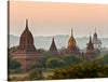 Step into the mystical world of ancient Myanmar with this captivating print of the Bagan temple. Once known as Pagan, this temple city was founded in the 9th century and served as the religious and political heart of the rich Bagan empire.