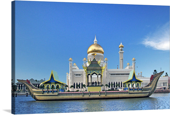 Immerse yourself in the serene beauty of this exquisite print capturing the iconic Sultan Omar Ali Saifuddien Mosque, a symbol of Brunei’s rich cultural heritage. The artwork encapsulates the mosque’s majestic presence, with its golden dome gleaming under the azure sky, reflecting off the tranquil waters surrounding it. Traditional boats adorn the foreground, adding a touch of historical elegance. 