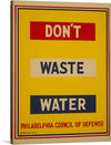 “Water Waste” is a striking piece of artwork that encapsulates a powerful message within its simplistic yet bold design. The vibrant yellow backdrop, adorned with contrasting red and white text, immediately captures the eye, drawing viewers into its urgent plea - “DON’T WASTE WATER”.