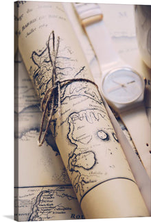  “Rolled Map” is an enchanting print that beckons you to explore distant lands and chart your own course. This captivating piece features an intricately detailed map, elegantly rolled and bound, as if whispering tales of undiscovered territories. The soft, neutral tones evoke a sense of nostalgia, while the delicate linework traces coastlines, mountain ranges, and ancient routes.