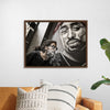 "Man With Dreadlocks and Sunglasses Poses Near Tupac Shakur Portrait"