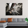 "Man With Dreadlocks and Sunglasses Poses Near Tupac Shakur Portrait"