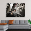 "Man With Dreadlocks and Sunglasses Poses Near Tupac Shakur Portrait"