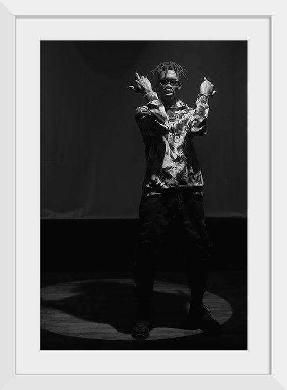 "Man in Printed Shirt and Black Pants Standing on Stage", cottonbro studio