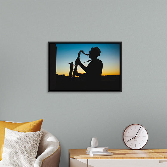 "Silhouette of a Man Playing Saxophone during Sunset", Victor Freitas