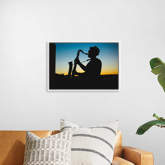 "Silhouette of a Man Playing Saxophone during Sunset", Victor Freitas