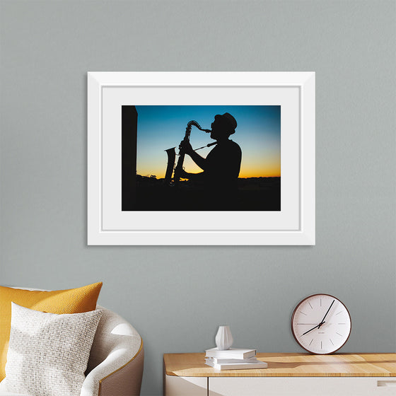 "Silhouette of a Man Playing Saxophone during Sunset", Victor Freitas