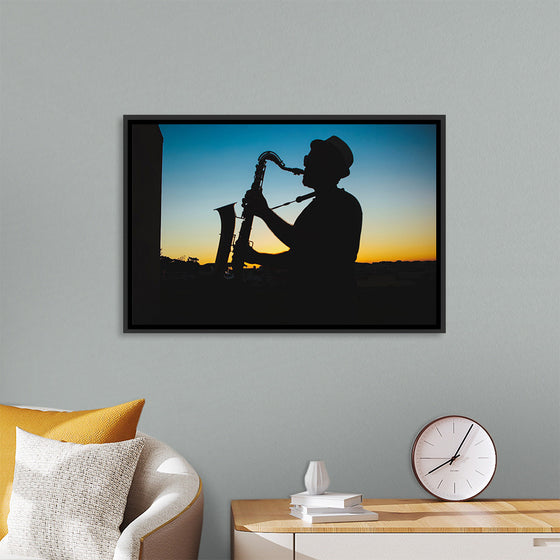 "Silhouette of a Man Playing Saxophone during Sunset", Victor Freitas