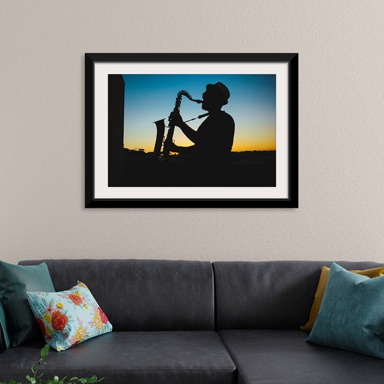 "Silhouette of a Man Playing Saxophone during Sunset", Victor Freitas