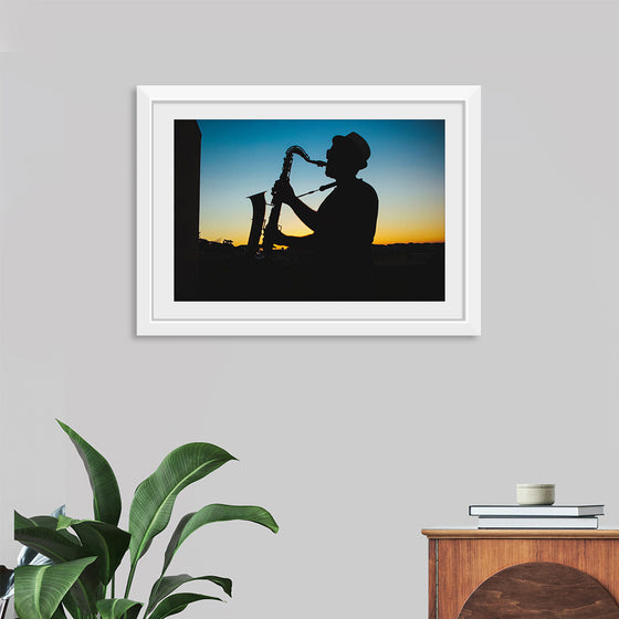 "Silhouette of a Man Playing Saxophone during Sunset", Victor Freitas